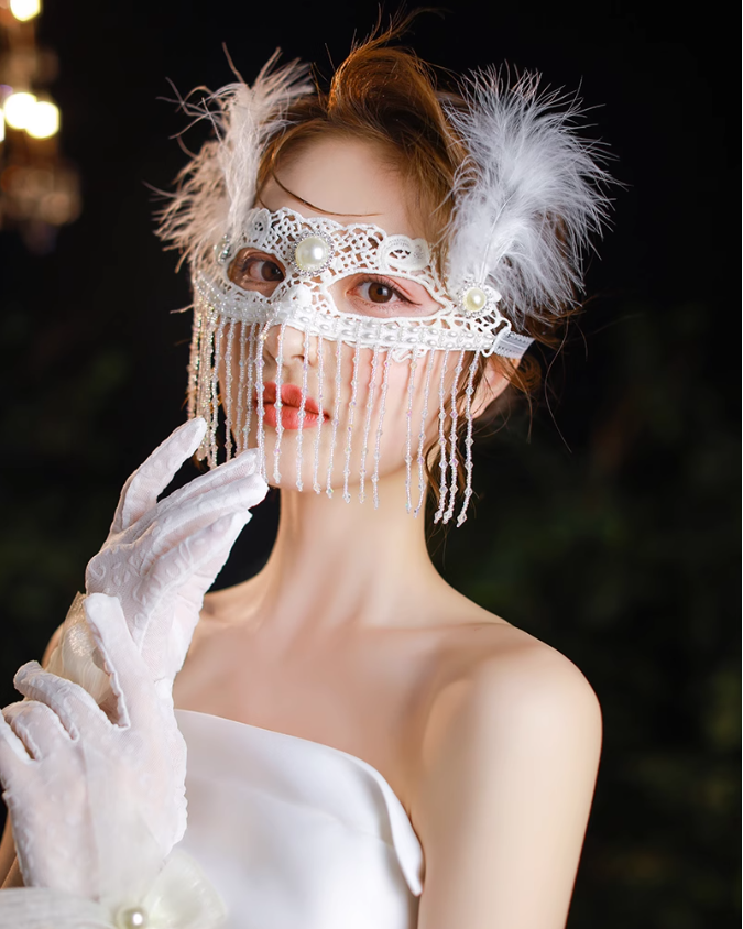 Elegant Masquerade Mask With White Feather and Pearl Accents